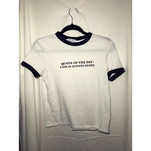 White t-shirt with quote and black boarder